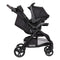 Side view with the car seat on the Baby Trend Passport Carriage DLX Stroller