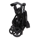 Load image into gallery viewer, Compact fold of the Baby Trend Passport Carriage DLX Stroller