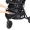 Front access to storage basket on the Baby Trend Passport Seasons All-Terrain Stroller Travel System with EZ-Lift 35 PLUS Infant Car Seat