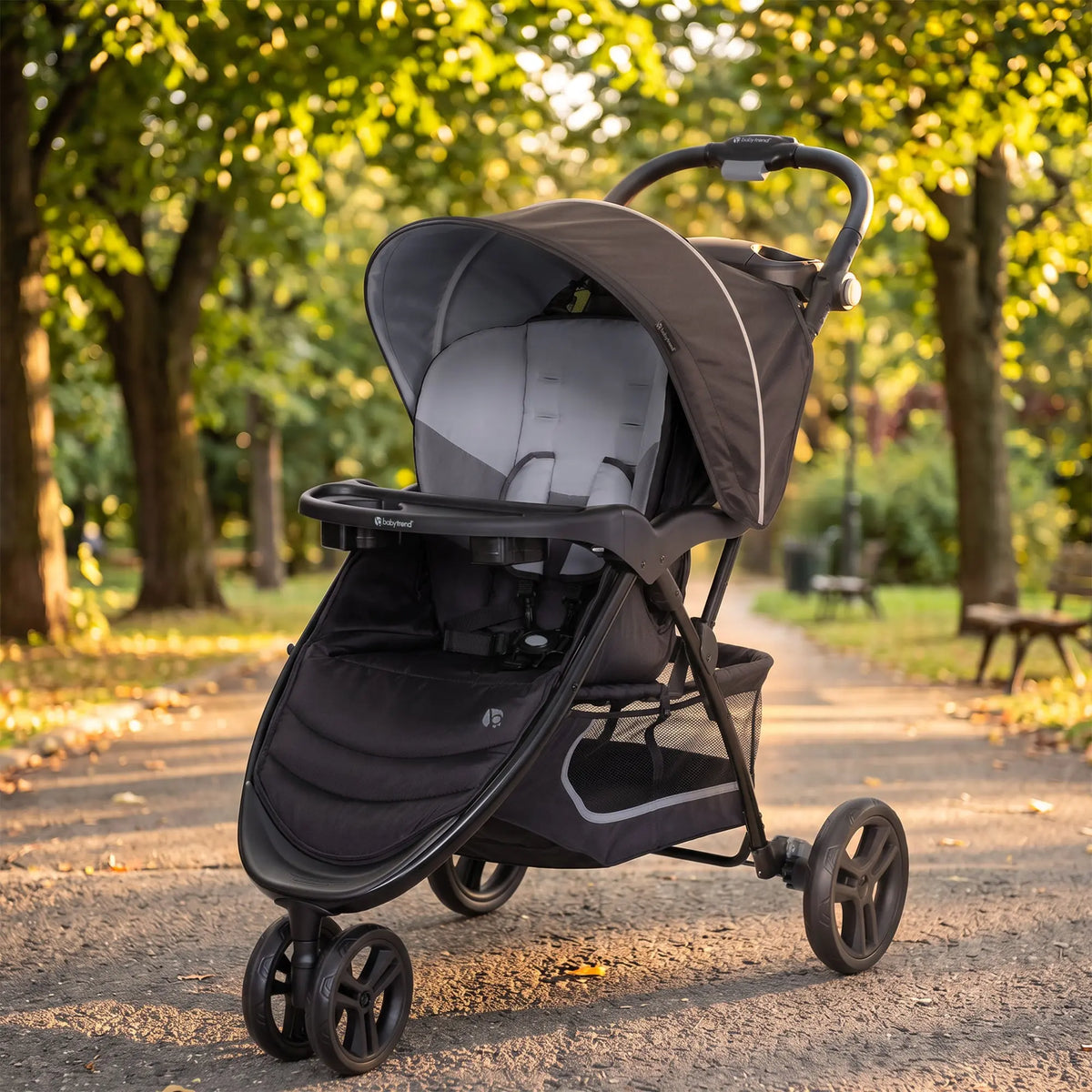 Baby Trend EZ Ride Stroller sitting in a park