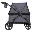 Load image into gallery viewer, Baby Trend Expedition 2-in-1 Stroller Wagon side view with canopy and mesh cover