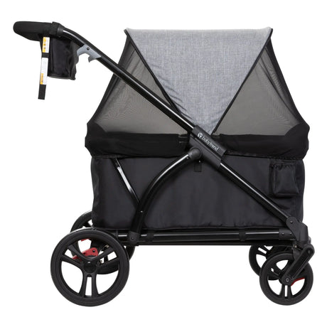 Side view of the Baby Trend Expedition 2-in-1 Stroller Wagon with netting cover