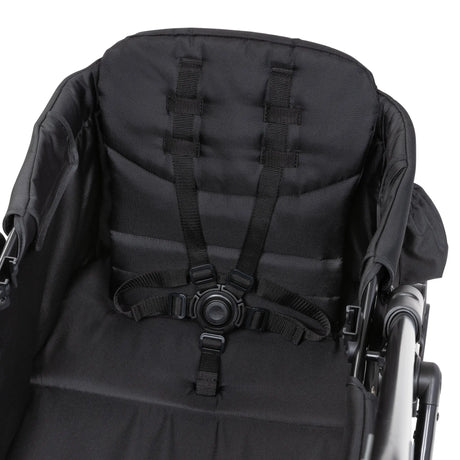Top view of the three point safety harness from the Baby Trend Expedition 2-in-1 Stroller Wagon