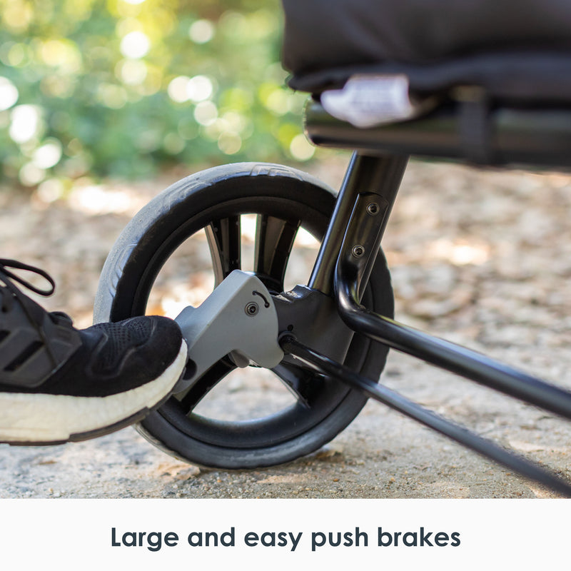Large and easy push brakes of the Baby Trend Expedition LTE 2-in-1 Stroller Wagon