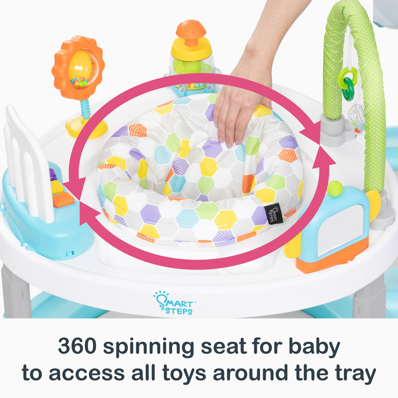 360 spinning seat for baby to access all toys around the tray of the Smart Steps by Baby Trend Bounce N’ Dance 4-in-1 Activity Center Walker