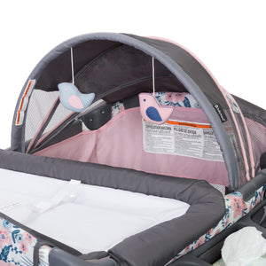 Baby Trend Deluxe II Nursery Center Playard canopy with two hanging toys