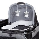 Load image into gallery viewer, Baby Trend Simply Smart Nursery Center removable rock-a-bye bassinet with two hanging toys