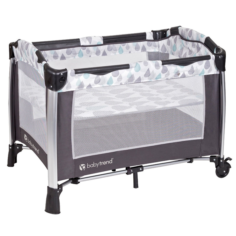 Baby Trend GoLite Twins Nursery Center Playard includes full-size bassinet