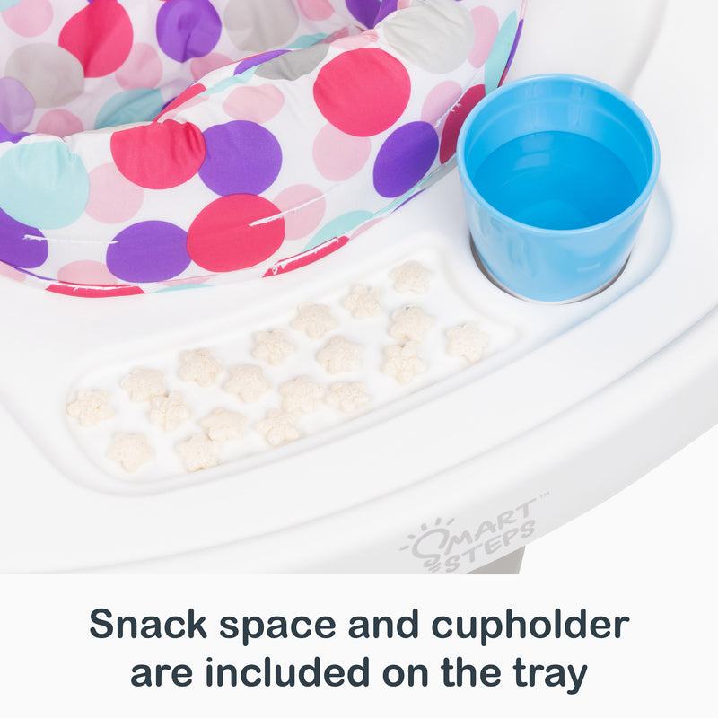 Snack space and cup holder are included on the tray of the Smart Steps 3-in-1 Bounce N’ Play Activity Center PLUS
