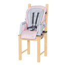 Load image into gallery viewer, Baby Trend Everlast 7-in-1 High Chair in toddler booster mode on a chair