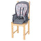 Booster mode with the seat on a dining chair from the MUV by Baby Trend 7-in-1 Feeding Center High Chair