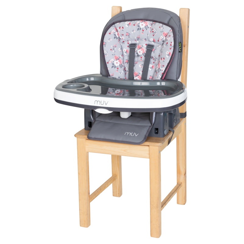 Infant booster mode on the dining chair from the MUV by Baby Trend 7-in-1 Feeding Center High Chair