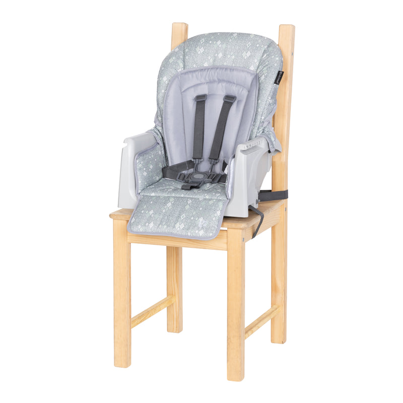 Toddler booster mode on a dining chair of the Baby Trend Everlast 7-in-1 High Chair