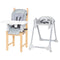 Sibling mode with infant seat on dining chair and booster toddler mode from the Baby Trend Everlast 7-in-1 High Chair