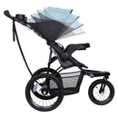 Load image into gallery viewer, Baby Trend XCEL-R8 Jogger Stroller with ratcheting canopy for child shades from sun