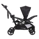 Load image into gallery viewer, Side view of the Baby Trend Sit N' Stand Double 2.0 Stroller with rear seat as a jump seat or stand on platform