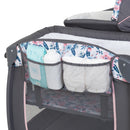 Load image into gallery viewer, Pocket storage for diapers and accessories included with the Baby Trend Lil' Snooze Deluxe II Nursery Center Playard
