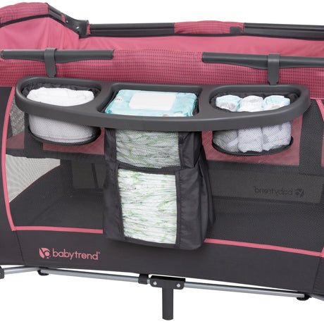 Baby Trend Lil’ Snooze Deluxe III Nursery Center Playard for Twins includes deluxe parent organizer for diapers and wipes