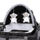 Load image into gallery viewer, Two hanging toys on the napper of the Baby Trend Lil' Snooze Deluxe Plus Nursery Center Playard 
