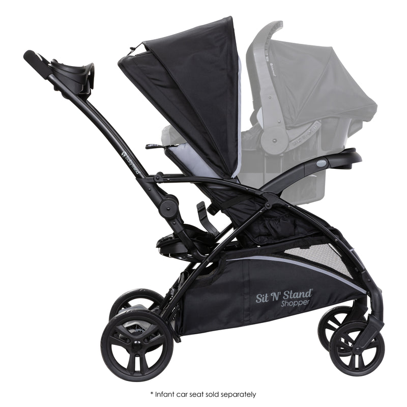 Side view of the Baby Trend Sit N Stand 5-in-1 Shopper Stroller with infant car seat attached for a travel system, sold separately
