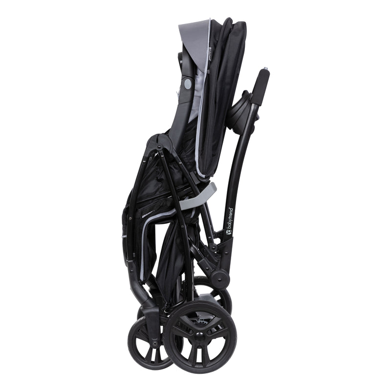 Compact fold of the Baby Trend Sit N Stand 5-in-1 Shopper Stroller