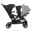 Load image into gallery viewer, Side view of the Baby Trend Sit N' Stand Double 2.0 Stroller with a car seat in front