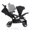 Baby Trend Sit N' Stand Double 2.0 Stroller with a infant car seat in the rear seat