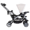Baby Trend Sit N' Stand Double Stroller side view of the front child seat and rear stand on platform for standing