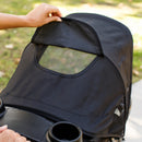 Load image into gallery viewer, The canopy has a peek-a-boo window on the Baby Trend Pro Steer Jogger Stroller Travel System 