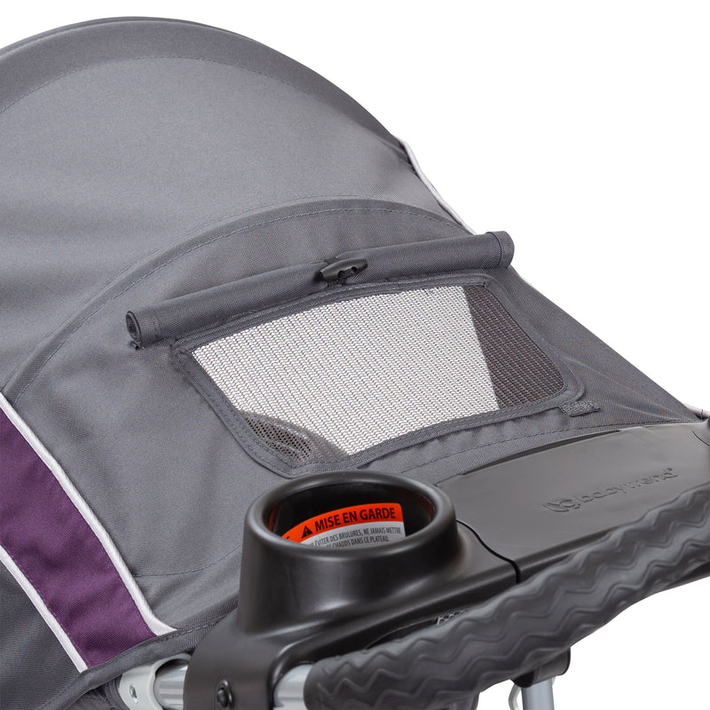 Baby Trend Expedition® Jogger Travel System has canopy with peek-a-boo for parents to check on their child