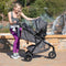 Baby Trend Tango 3 All-Terrain Stroller Travel System mother using the infant car seat on the stroller for her baby