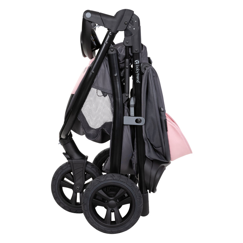 Compact fold of the Baby Trend Tango 3 All-Terrain Stroller Travel System