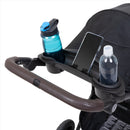 Load image into gallery viewer, Parent tray with two cup holders and cell phone positioner on the MUV by Baby Trend Tango Pro Stroller Travel System