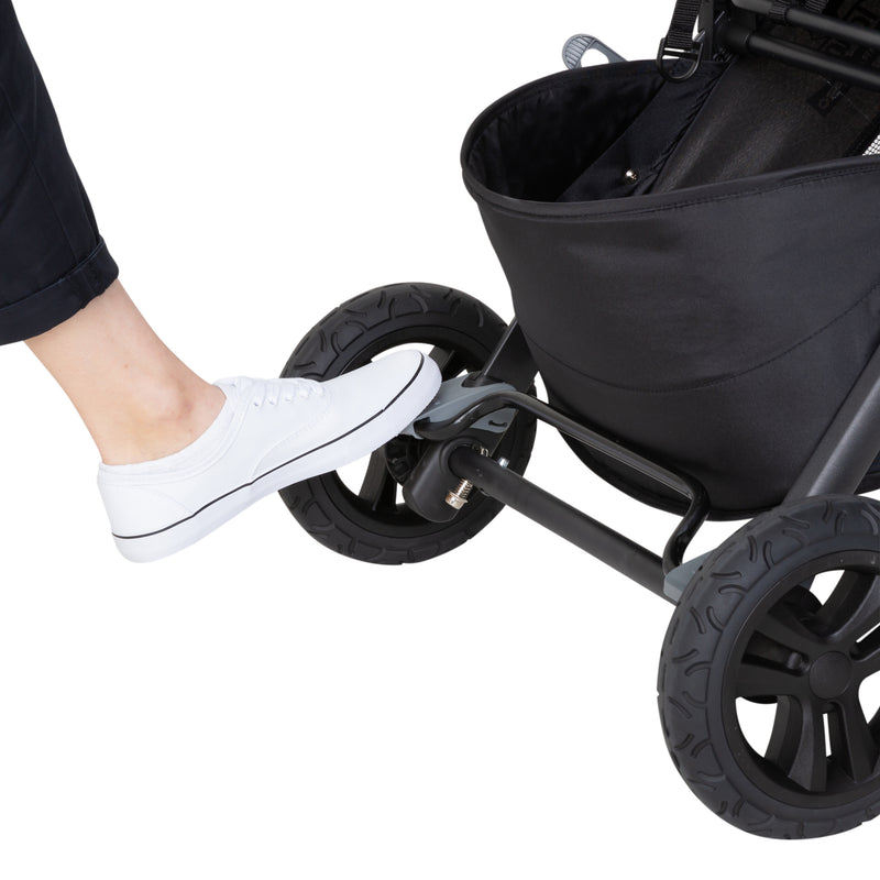 Brakes on rear wheels of the MUV by Baby Trend Tango Pro Stroller Travel System
