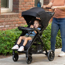 Load image into gallery viewer, Baby Trend Passport Cargo Stroller Travel System with child and mother