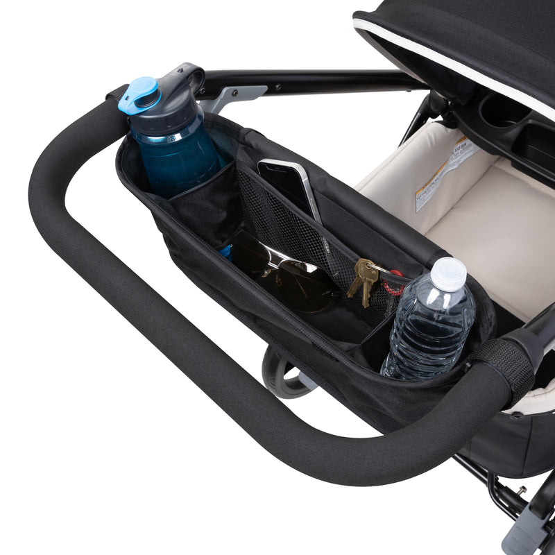Soft parent console with storage compartment and cup holder on the Baby Trend Expedition 2-in-1 Stroller Wagon PLUS