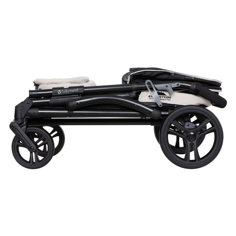 Folds flat of the Baby Trend Expedition 2-in-1 Stroller Wagon PLUS, wheels are removable