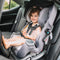 Child is sitting in the Baby Trend Cover Me 4-in-1 Convertible Car Seat
