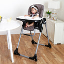 Load image into gallery viewer, Toddler girl sitting at the dinning table in the Baby Trend A La Mode Snap Gear 5-in-1 High Chair