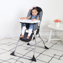 Load image into gallery viewer, Child girl sitting in the Baby Trend Fast Fold High Chair