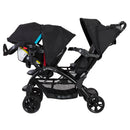 Load image into gallery viewer, Baby Trend Sit N' Stand Double Stroller with infant car seat in the front and rear seat for child sitting