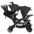 Load image into gallery viewer, Baby Trend Sit N' Stand Double Stroller side view of the front seat and rear seat combined with an infant car seat