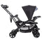 Baby Trend Sit N' Stand Double Stroller side view of the front seat, bench and stand on platform