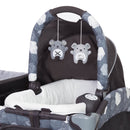Load image into gallery viewer, The Removable Rock-A-Bye Bassinet comes with two hanging toys from the MUV by Baby Trend Custom Grow Nursery Center Playard