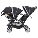 Load image into gallery viewer, Baby Trend Sit N' Stand Double Stroller can be combined with an infant car seat to create a travel system
