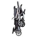 Load image into gallery viewer, Baby Trend Sit N' Stand Double Stroller is folded compact
