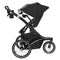 MUV by Baby Trend 180° 6-in-1 Jogger Stroller Travel System with child facing parents while strolling