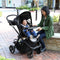 Baby Trend City Clicker Pro Snap Gear Stroller Travel System of mother sitting in front of her child playing
